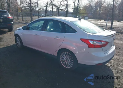2014 Ford Focus Titanium из США, поврежденный, VIN 1FADP3J26EL187951